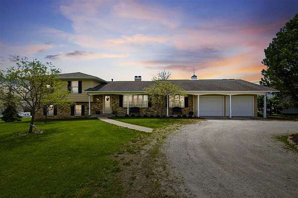 16.6 Acres of Land with Home for Sale in Scott Township, Iowa