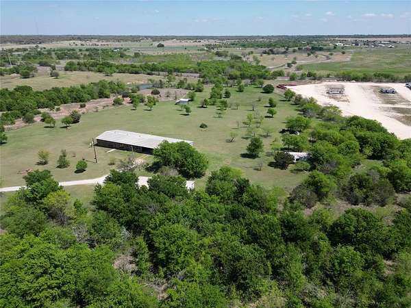 26.1 Acres of Land with Home for Sale in Cleburne, Texas