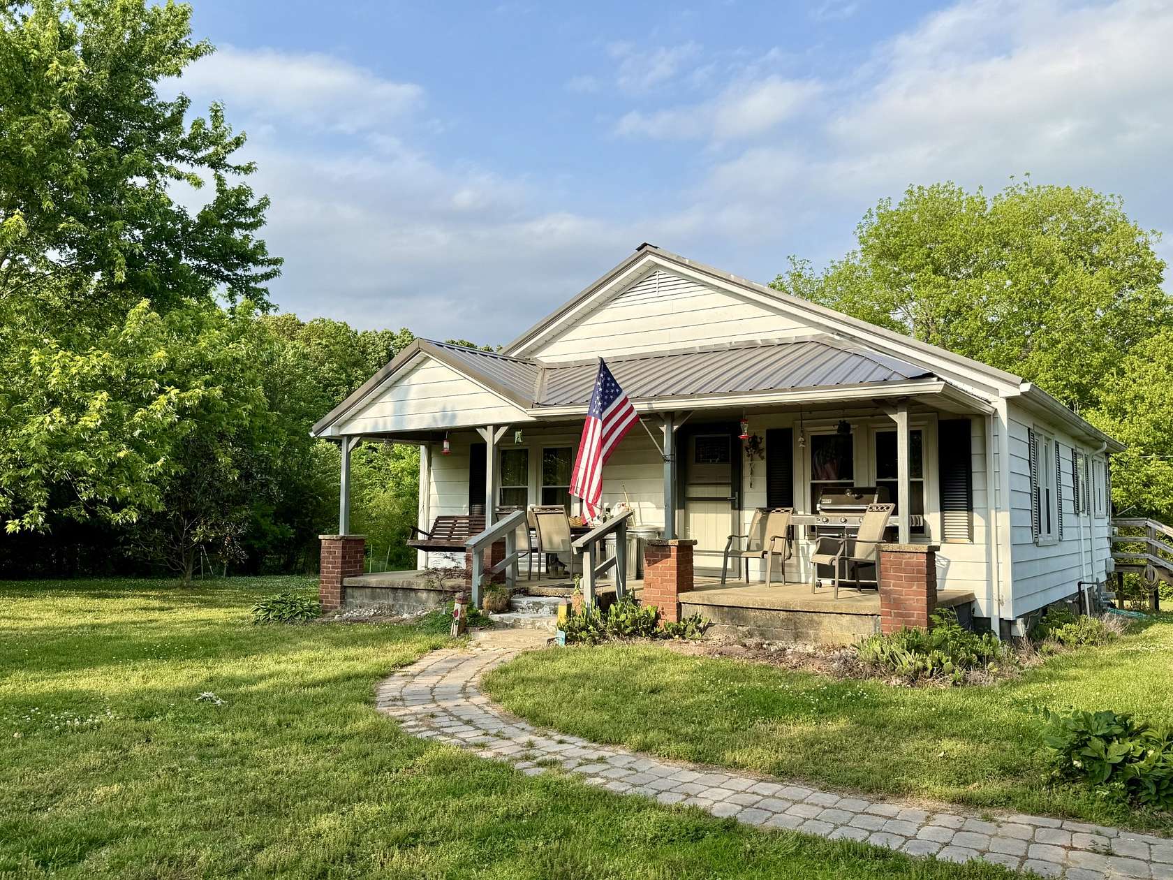 8.2 Acres of Land with Home for Sale in Big Sandy, Tennessee