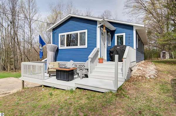 2 Acres of Land with Home for Sale in Honor, Michigan