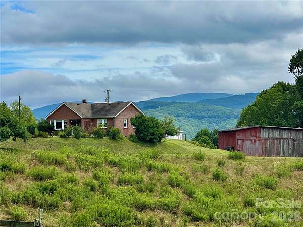 3.25 Acres of Land with Home for Sale in Elk Park, North Carolina
