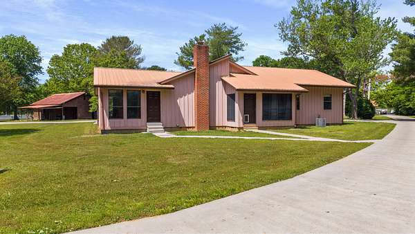 5.67 Acres of Land with Home for Sale in Delano, Tennessee