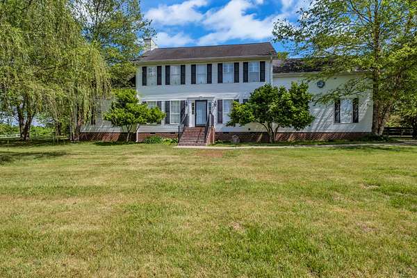 5 Acres of Land with Home for Sale in Castalian Springs, Tennessee