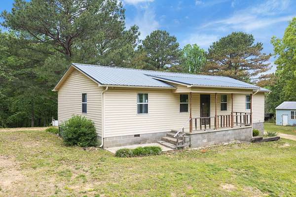 20 Acres of Land with Home for Sale in McKenzie, Tennessee