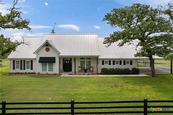 7.46 Acres of Land with Home for Sale in Luling, Texas