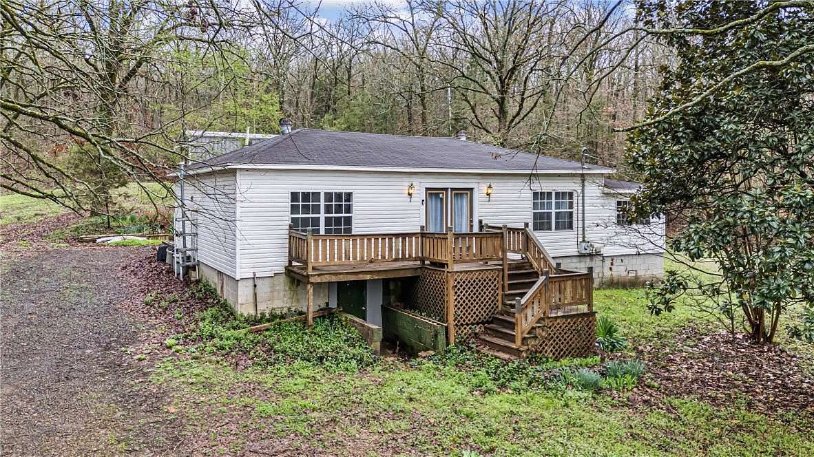 5.62 Acres of Land with Home for Sale in Hartman, Arkansas