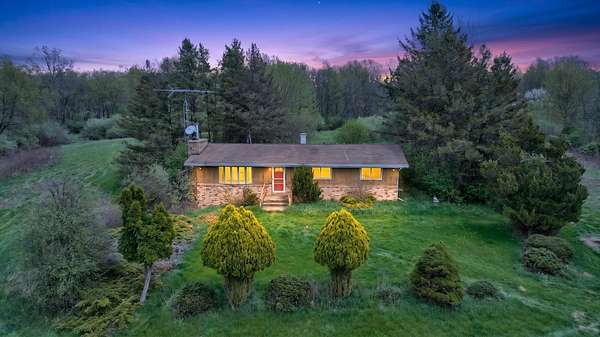 15.3 Acres of Recreational Land with Home for Sale in Grass Lake, Michigan