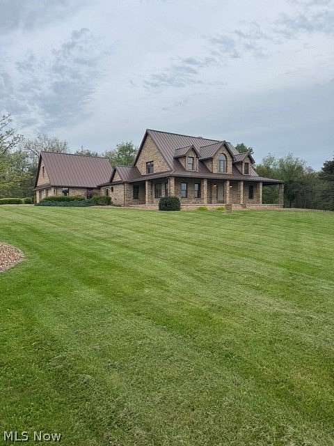 17.9 Acres of Land with Home for Sale in Rogers, Ohio
