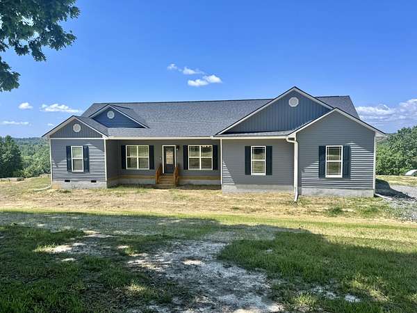 27.9 Acres of Agricultural Land with Home for Sale in Pikeville, Tennessee