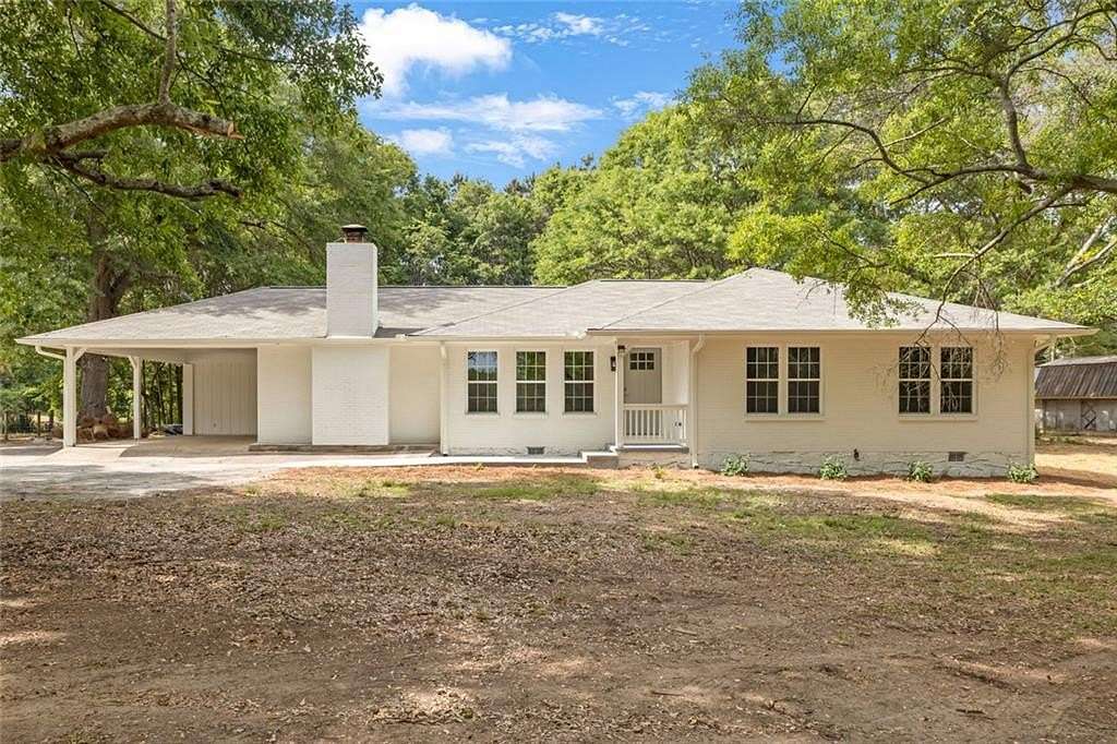 3.45 Acres of Land with Home for Sale in Conyers, Georgia