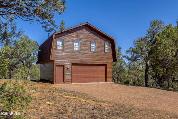 4.64 Acres of Land with Home for Sale in Overgaard, Arizona