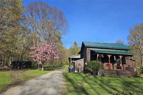 14.8 Acres of Land with Home for Sale in Naples, New York