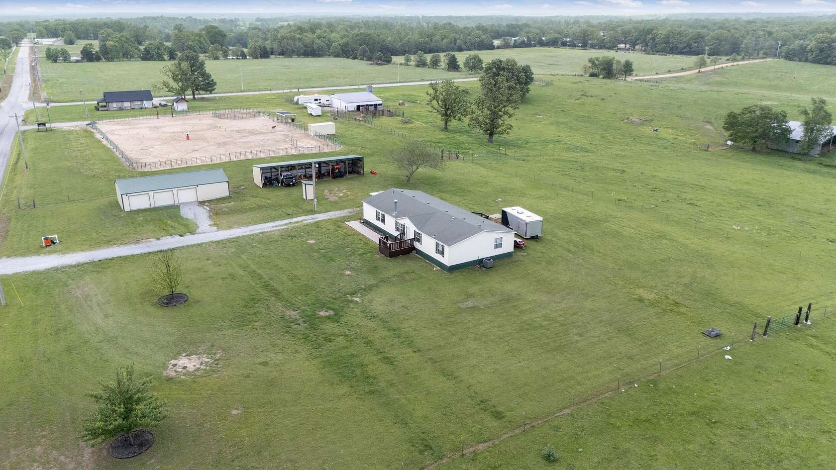 20.3 Acres of Land with Home for Sale in Wyandotte, Oklahoma