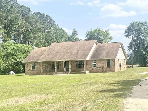 5.8 Acres of Land with Home for Sale in Atmore, Alabama