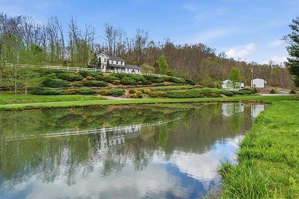 30.2 Acres of Land with Home for Sale in Connoquenessing, Pennsylvania