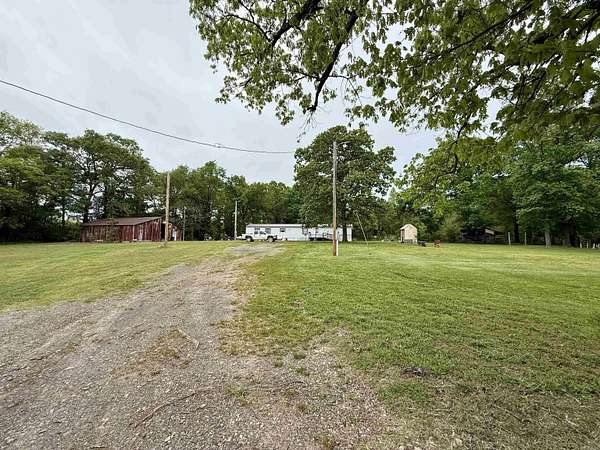 2.14 Acres of Land with Home for Sale in Cove, Arkansas