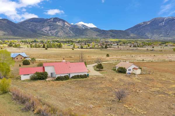 2 Acres of Land with Home for Sale in Arroyo Seco, New Mexico
