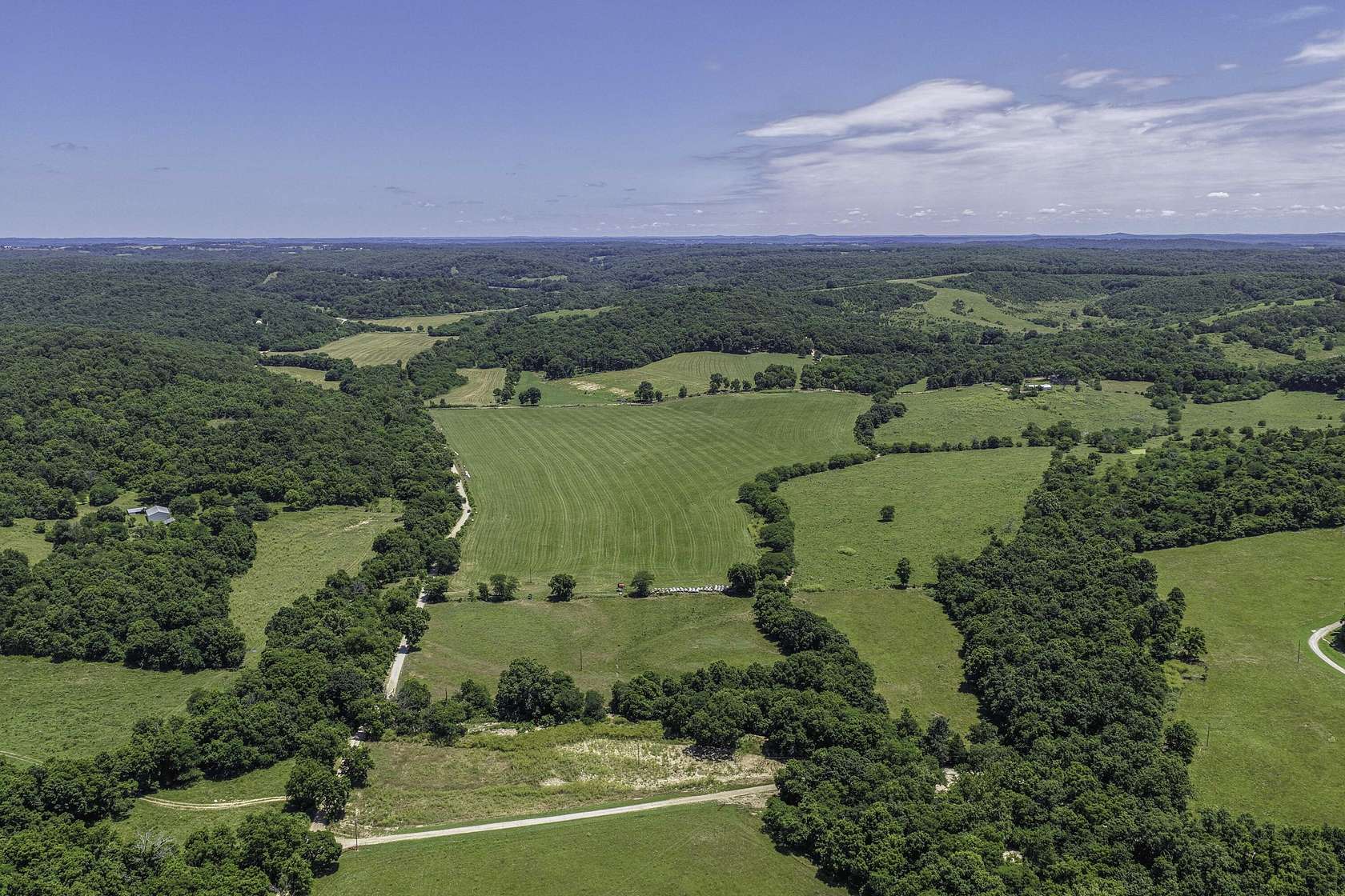 885 Acres of Land with Home for Sale in Norwood, Missouri
