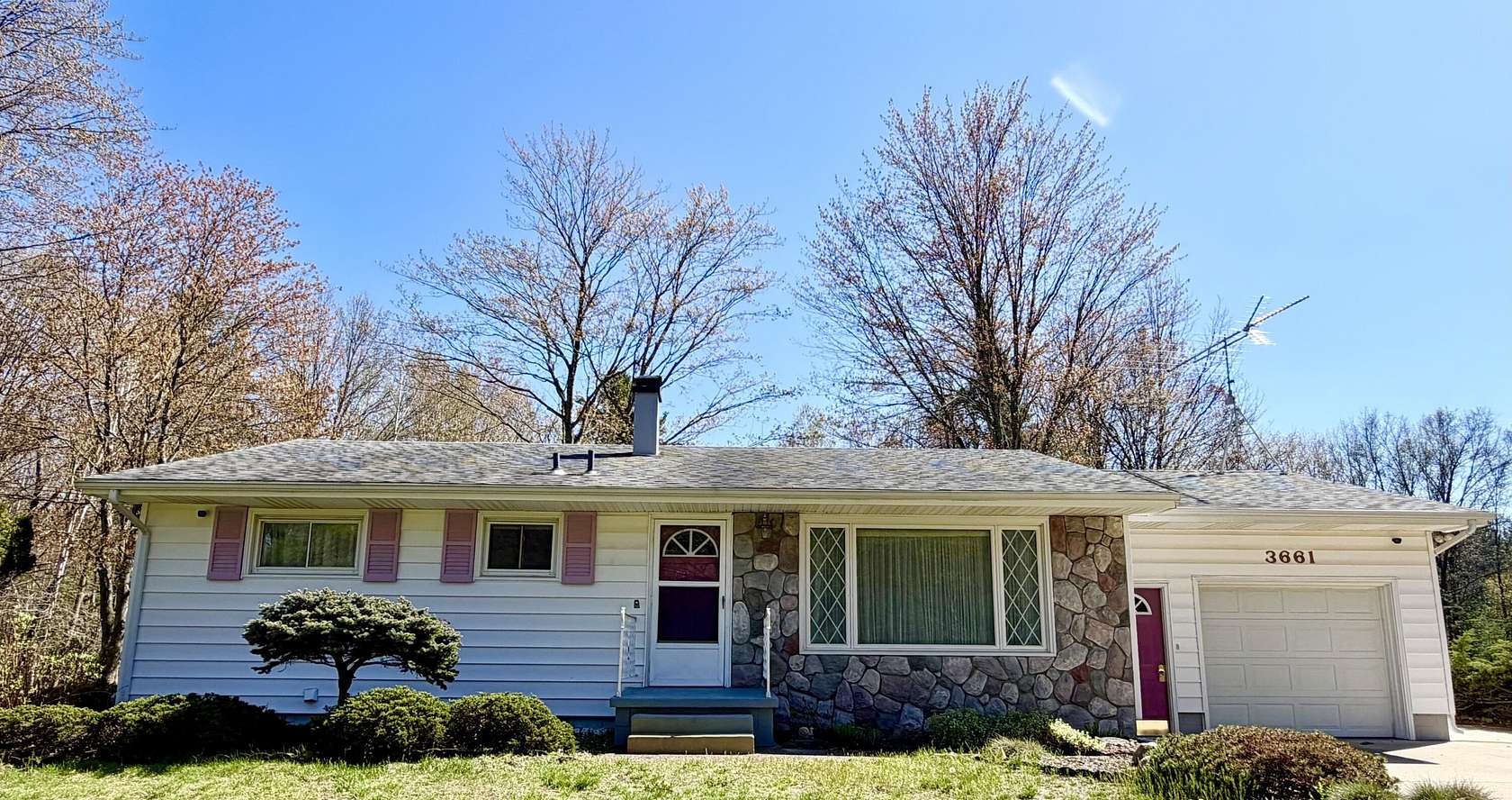 5 Acres of Land with Home for Sale in Fruitport, Michigan