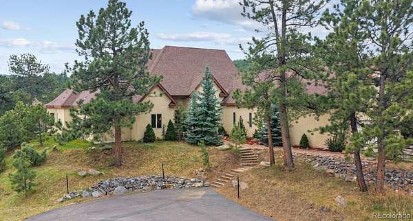 1.83 Acres of Land with Home for Sale in Evergreen, Colorado