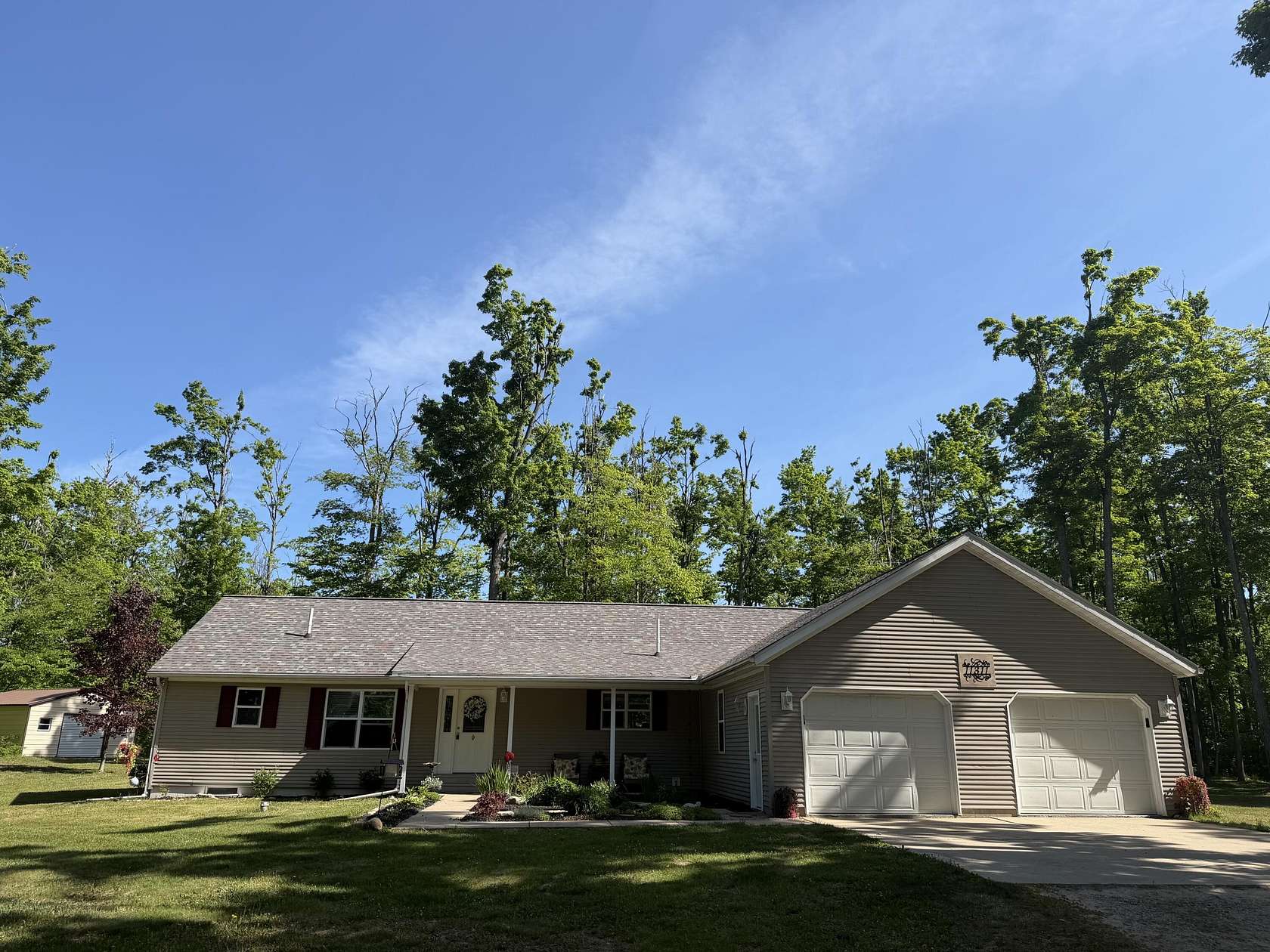 10 Acres of Recreational Land with Home for Sale in Elmira, Michigan