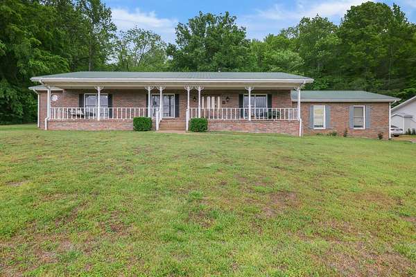 36.2 Acres of Recreational Land with Home for Sale in Centerville, Tennessee