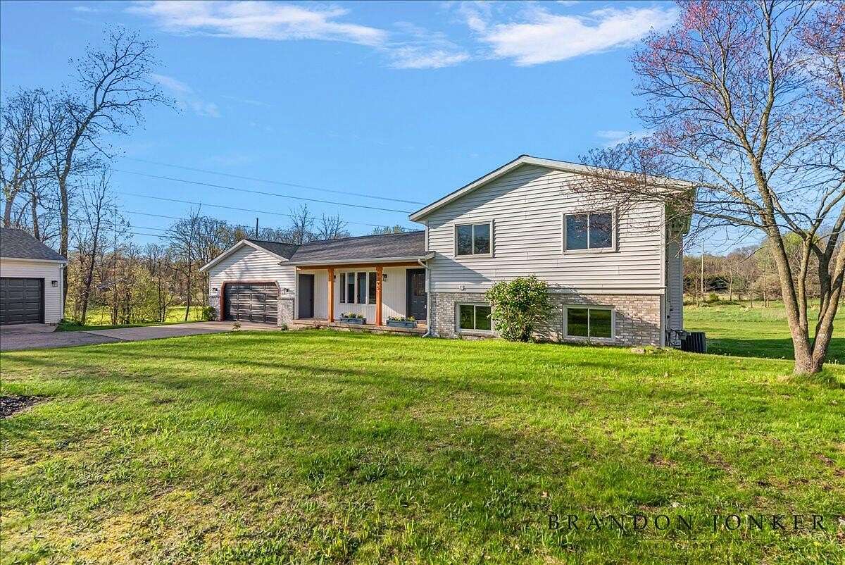 4 Acres of Land with Home for Sale in Alto, Michigan