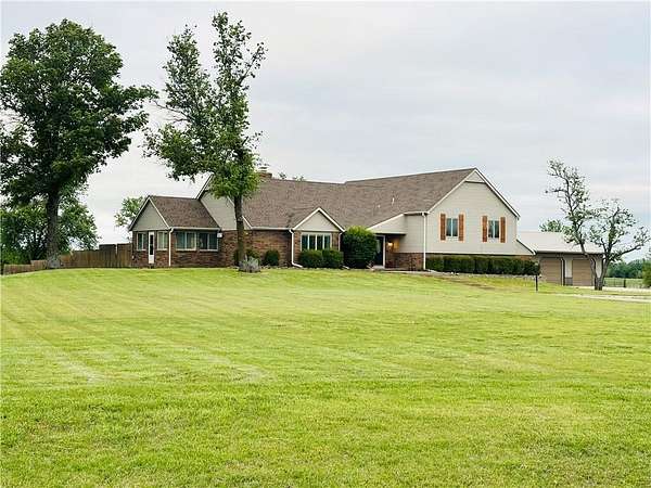 12 Acres of Land with Home for Sale in Parsons, Kansas