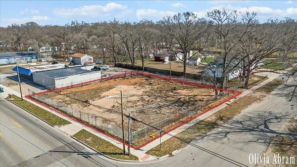 0.39 Acres of Commercial Land for Sale in Norton Shores, Michigan