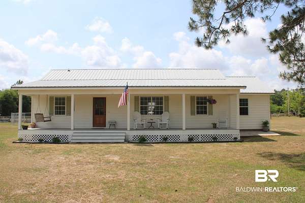 5 Acres of Land with Home for Sale in Summerdale, Alabama