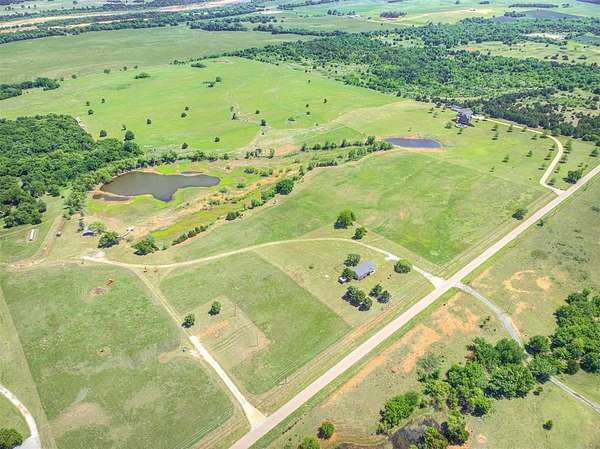 27.3 Acres of Recreational Land with Home for Sale in Guthrie, Oklahoma