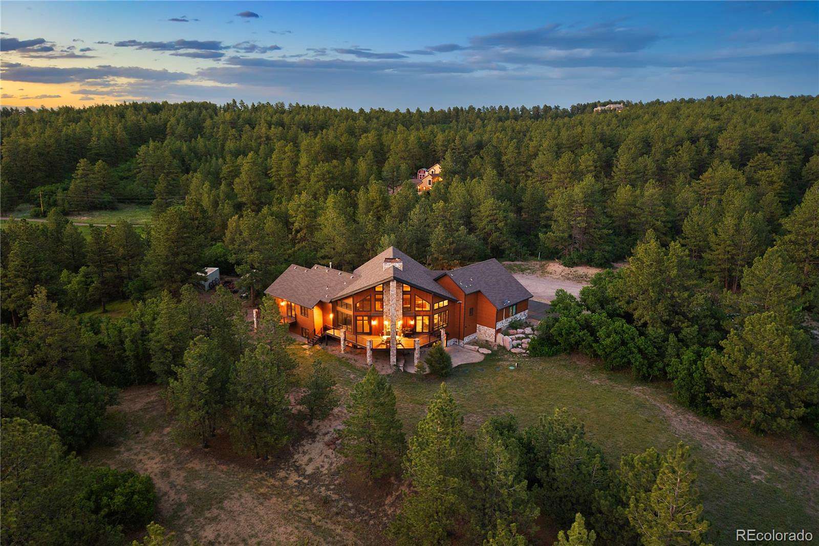 20.3 Acres of Land with Home for Sale in Larkspur, Colorado