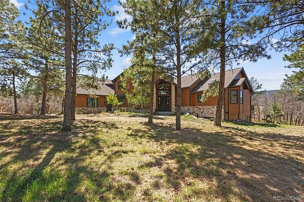 20.3 Acres of Land with Home for Sale in Larkspur, Colorado