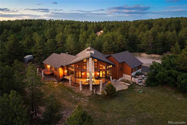 20.3 Acres of Land with Home for Sale in Larkspur, Colorado