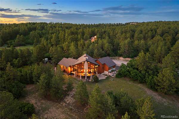 20.3 Acres of Land with Home for Sale in Larkspur, Colorado