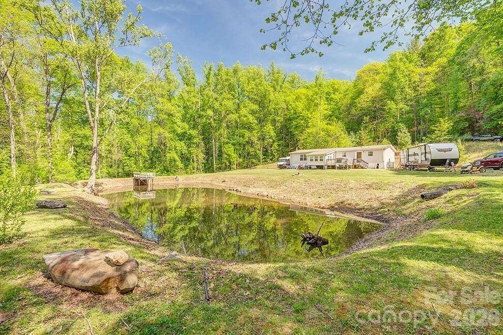 9.19 Acres of Land with Home for Sale in Weaverville, North Carolina