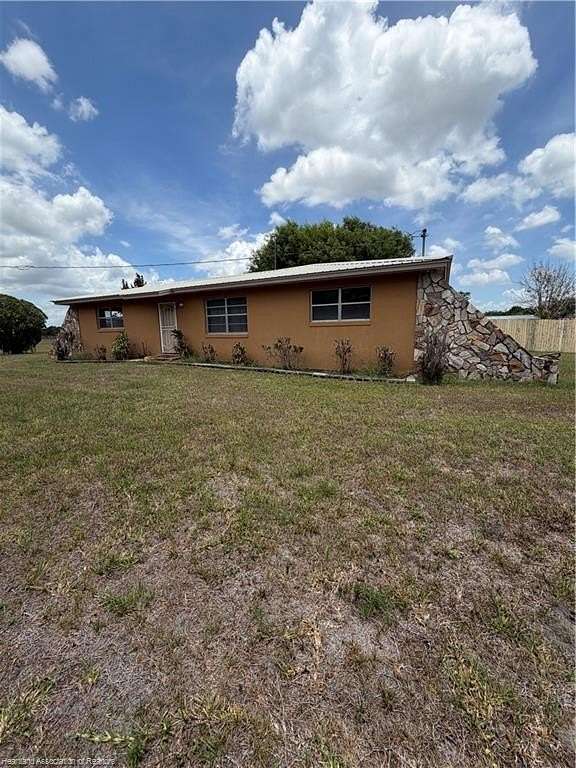 5 Acres of Land with Home for Sale in Lake Placid, Florida