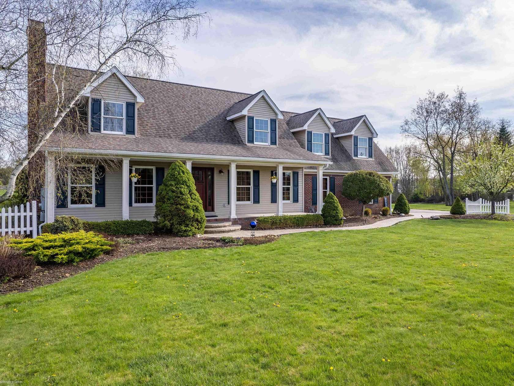 2.5 Acres of Land with Home for Sale in Leonard, Michigan