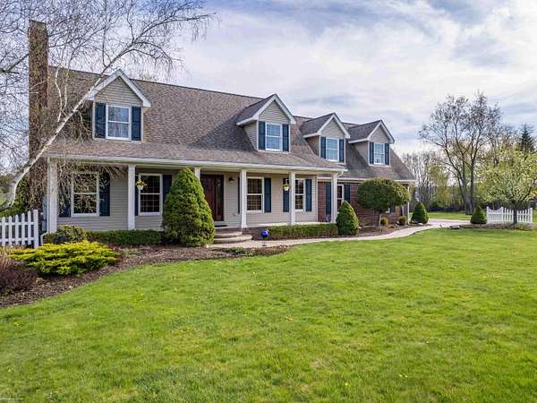 2.5 Acres of Land with Home for Sale in Leonard, Michigan