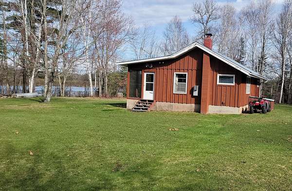 33.8 Acres of Recreational Land with Home for Sale in Butternut, Wisconsin