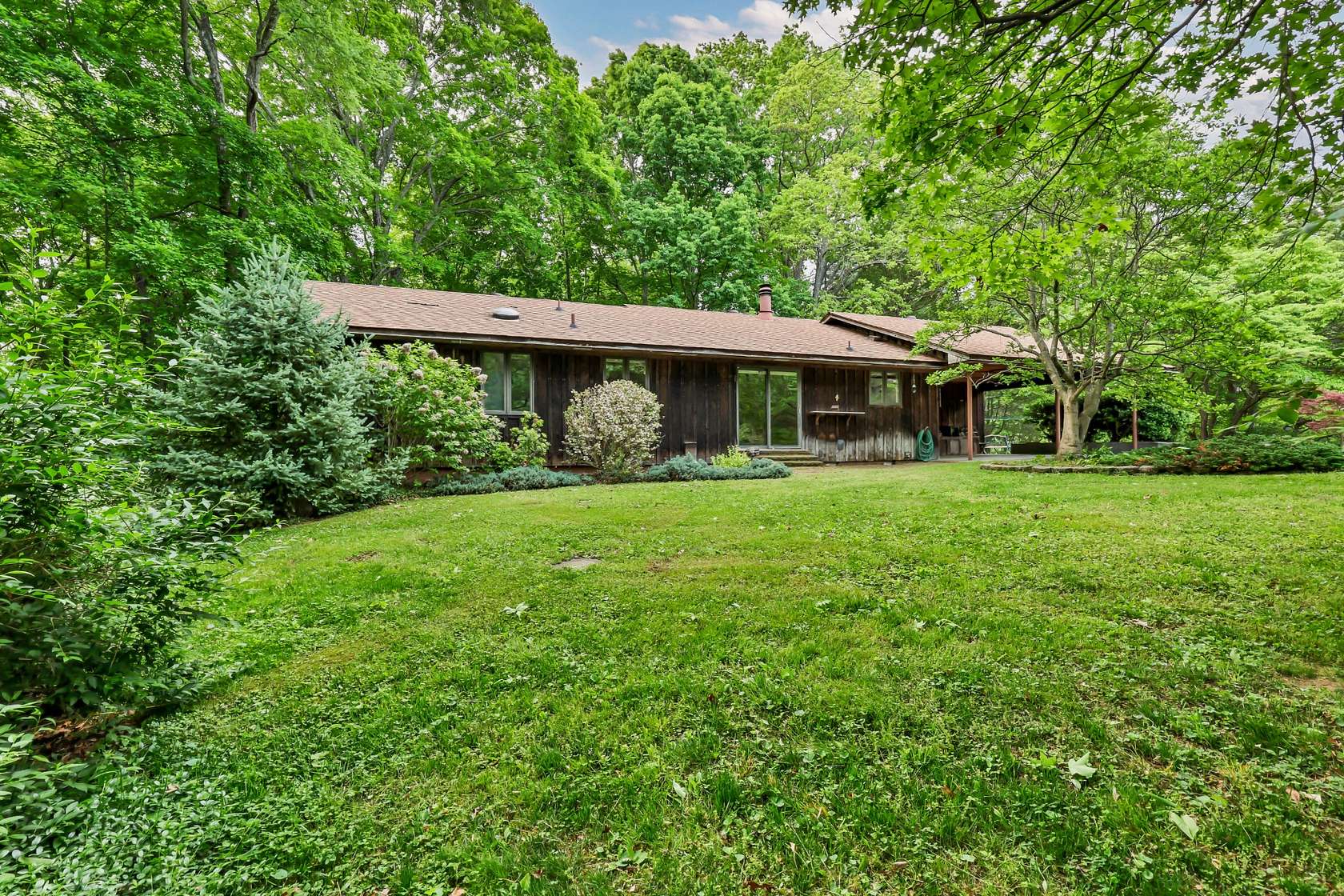 5.6 Acres of Land with Home for Sale in Adams, Tennessee