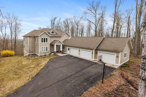 9.65 Acres of Land with Home for Sale in Petoskey, Michigan