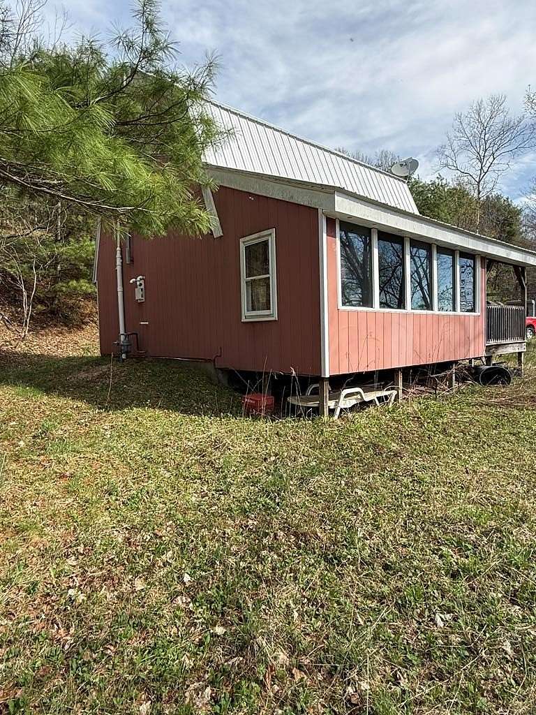 2.5 Acres of Land with Home for Sale in Oswayo, Pennsylvania