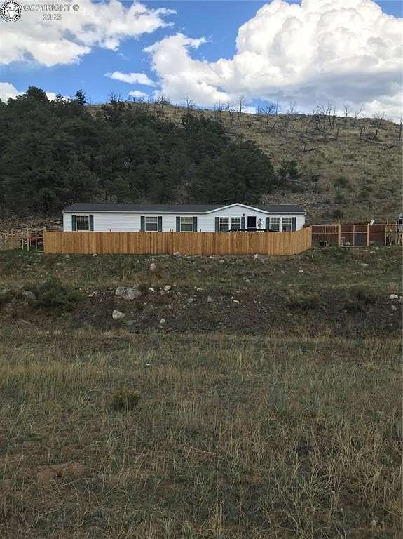 5.3 Acres of Land with Home for Sale in Cotopaxi, Colorado