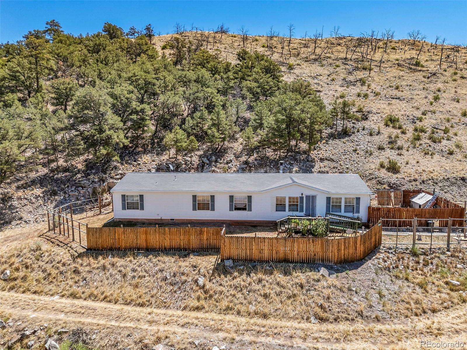 5.3 Acres of Land with Home for Sale in Cotopaxi, Colorado