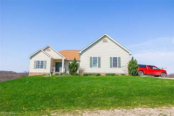 6.5 Acres of Land with Home for Auction in New Philadelphia, Ohio