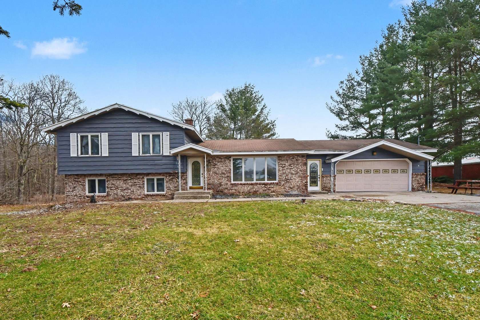 13.5 Acres of Land with Home for Sale in Rockford, Michigan