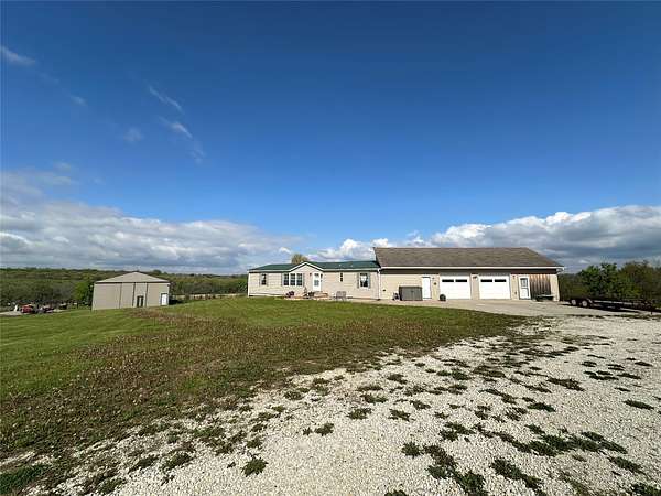 40 Acres of Agricultural Land with Home for Sale in St. Charles, Iowa