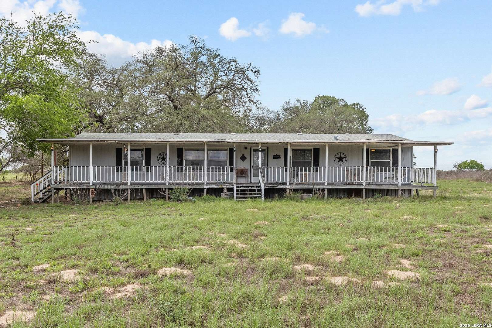 10 Acres of Land with Home for Sale in Floresville, Texas