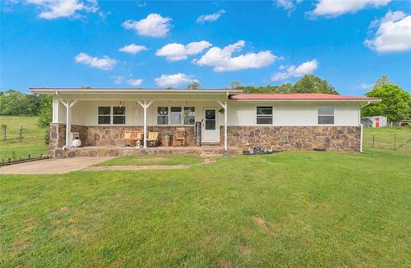 1.6 Acres of Land with Home for Sale in Huntsville, Arkansas